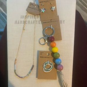 New of earrings, necklace, 3 set of rings, and a hanging charm. STOCKING STUFFER